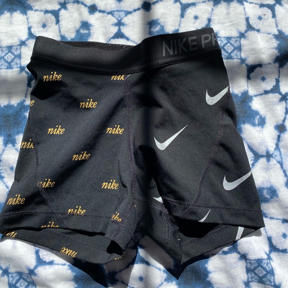 NIKE PRO gold and black